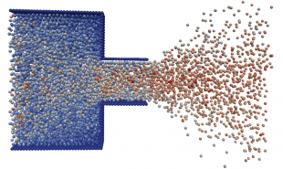 Extrusion of dense suspension through a narrow die